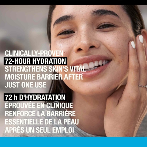 Woman touching her skin and smiling with a text stating, 'Clinically Proven 24-Hour Hydration '